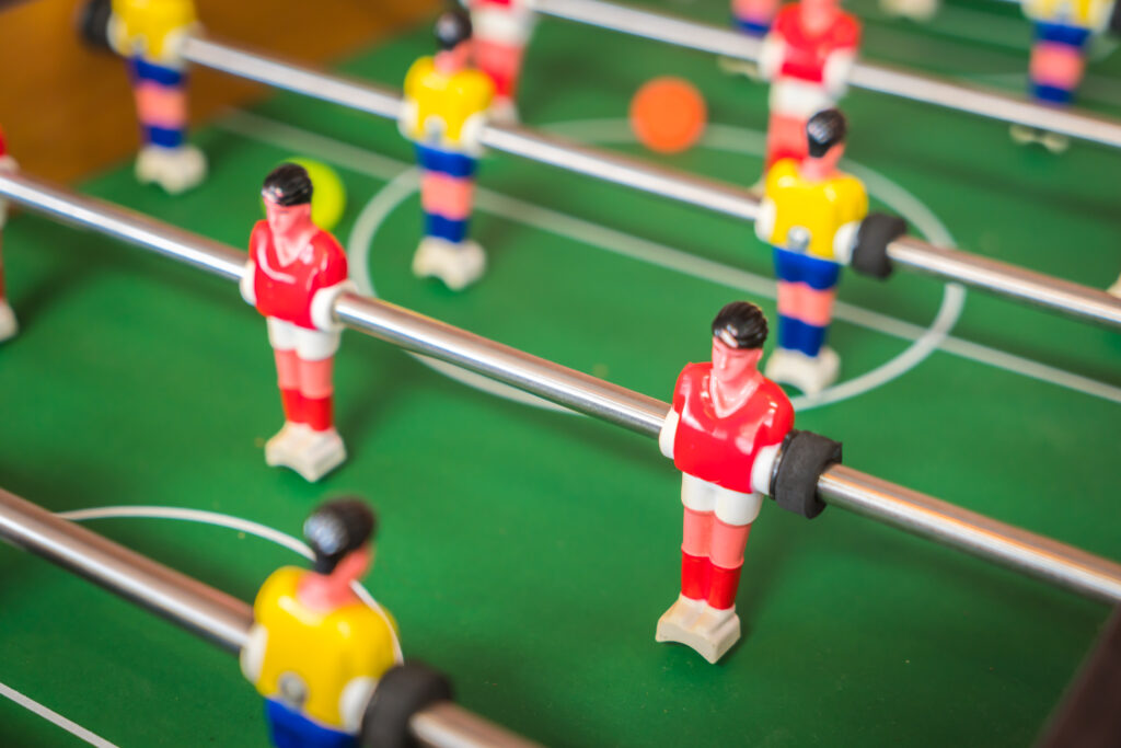 classic foosball table in a modern game room