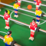 classic foosball table in a modern game room